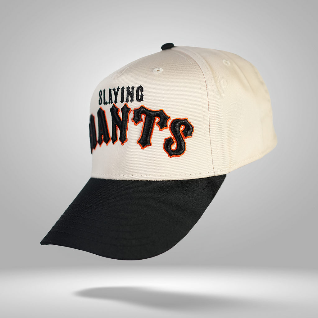 CreamBlackOrangeSlayingGiantsChristlikeLeftFacing1.png