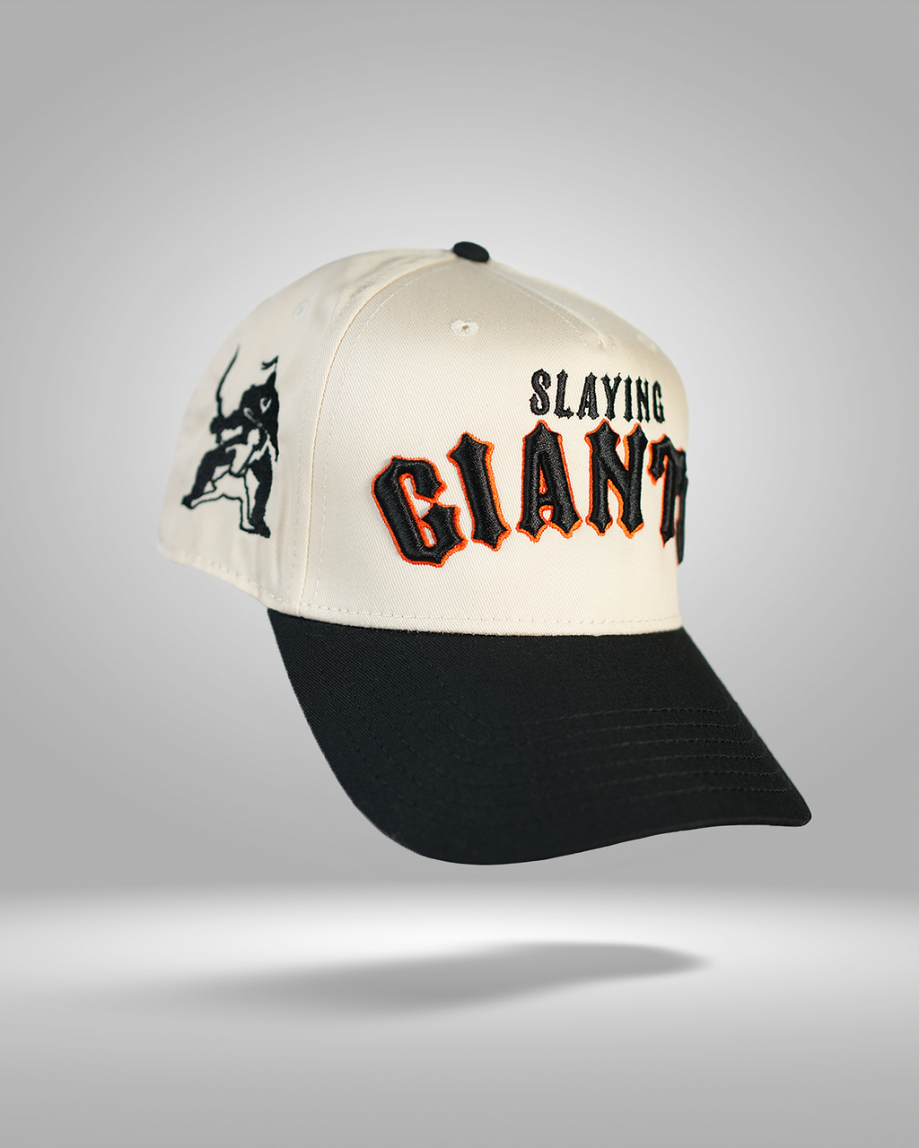 CreamBlackOrangeSlayingGiantsChristlikeRightFacing1.png