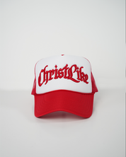 Red and white cap with 'Christ Like' text on a light gray background